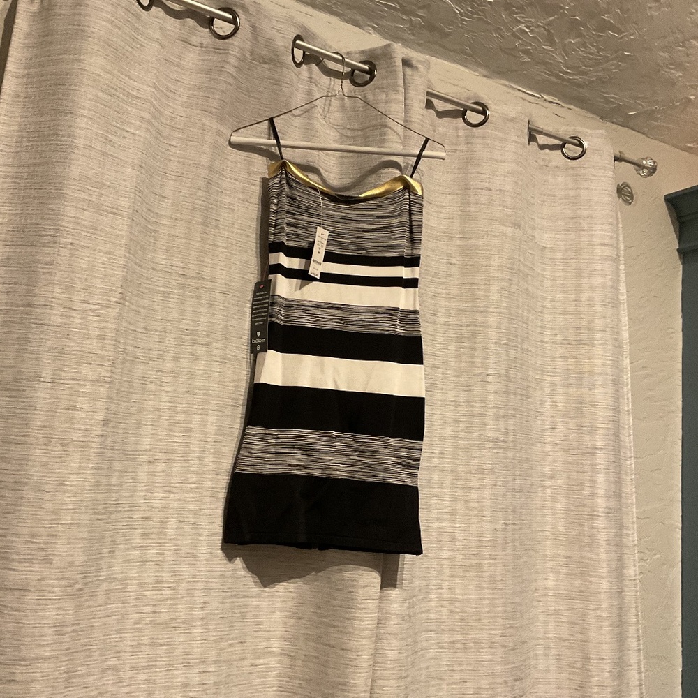 Bebe medium mini dress with gold accent